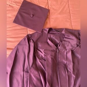 Burgundy cap and gown